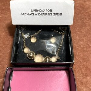 Avon Supernova necklace and earring set . Brand new and never removed.Still nwt